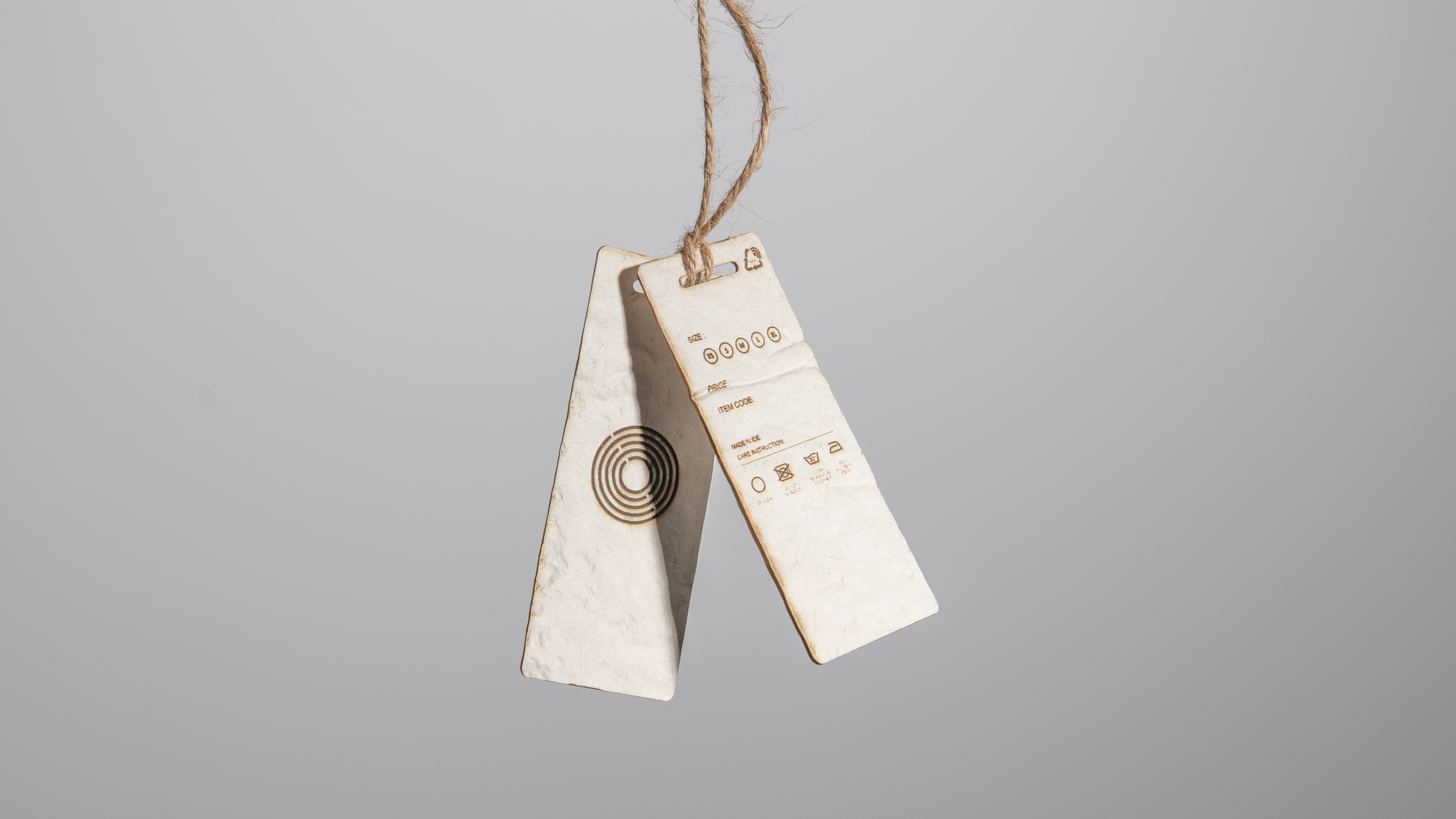 Pulpatronics plastic-free paper RFID and QR code tags reducing electronic waste in fashion — circular economy companies UK